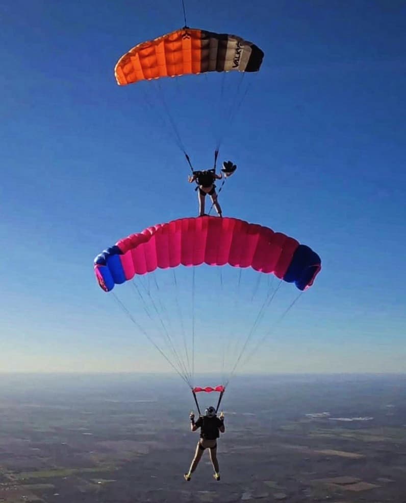Two canopies stacked under blue sky